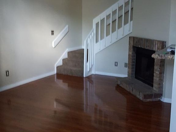 living room with stairs going up