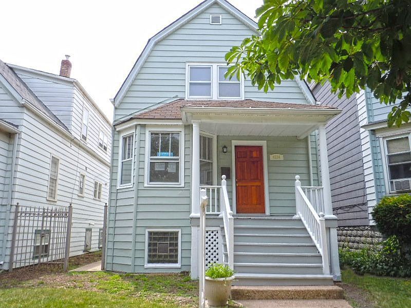 Front of 2 Story Updated Home with Three Finished Levels of Living Space