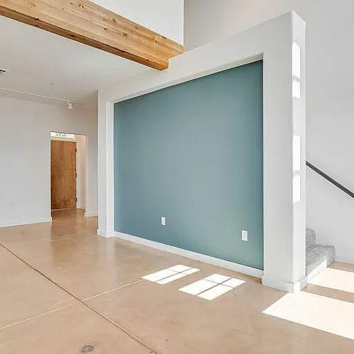 Carpeted stairwell to open bedroom-loft in #3202, "The Edward".