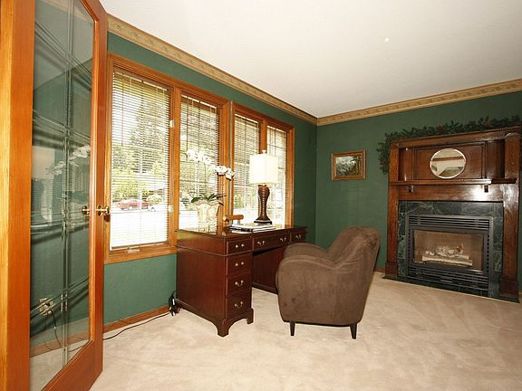 Den w/Fireplace and French Doors