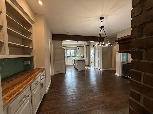French Style Country Kitchen with hearth room and serving bar