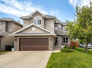 23 E Strathlea Cres SW, Calgary, AB T3H5A8