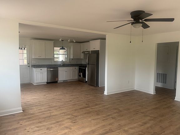 Living area looking into kitchen