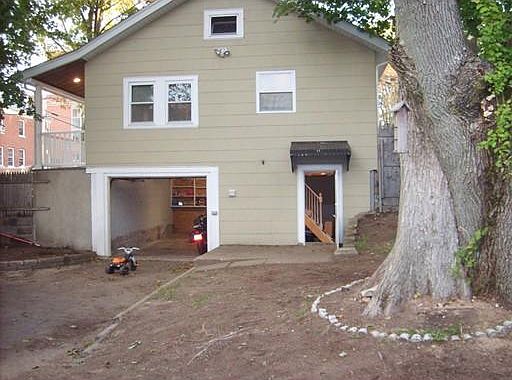Garage entrance, back yard