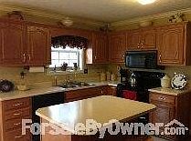 Kitchen...great appliances all stay
						:
						View the backyard, park and wildlife outside your window and bay eating area