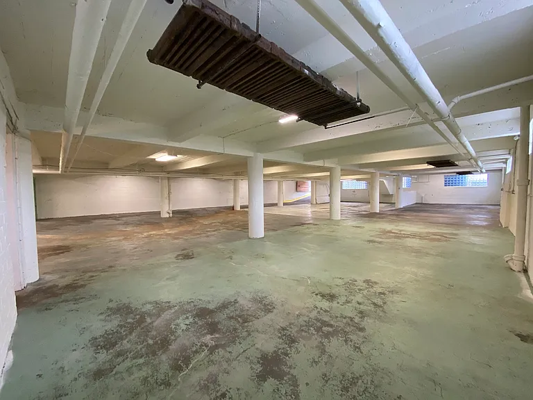 Another angle of the main space. Ceiling Height: Approx. 9_10 ft. (varies with beams)