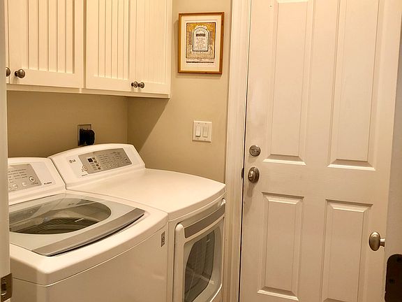 Laundry room by master bedro