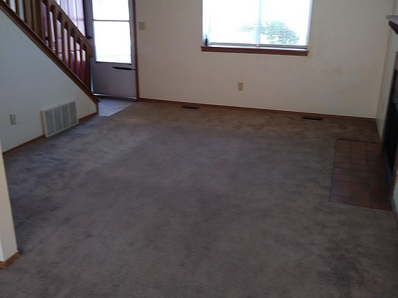 Enter the home into the comfy living room.