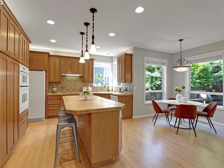 13819 NW Falconridge Ln — Photo 8