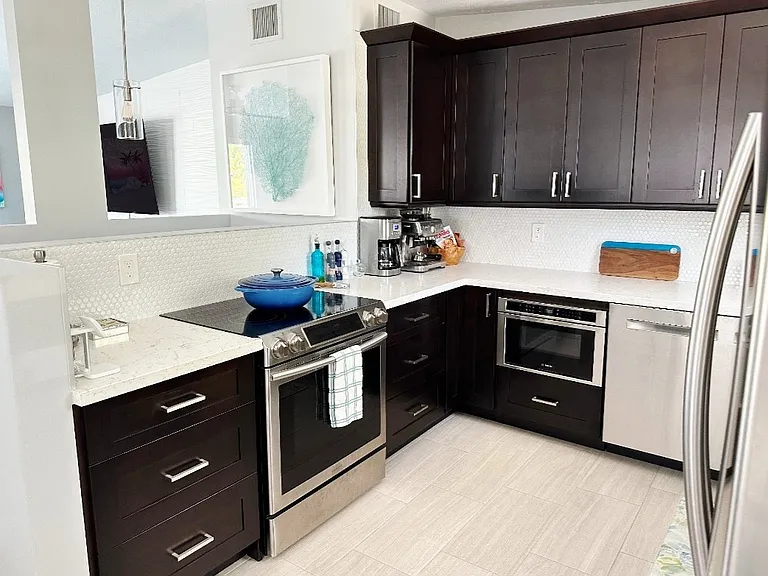 N Coconut Palm Blvd — Photo 13