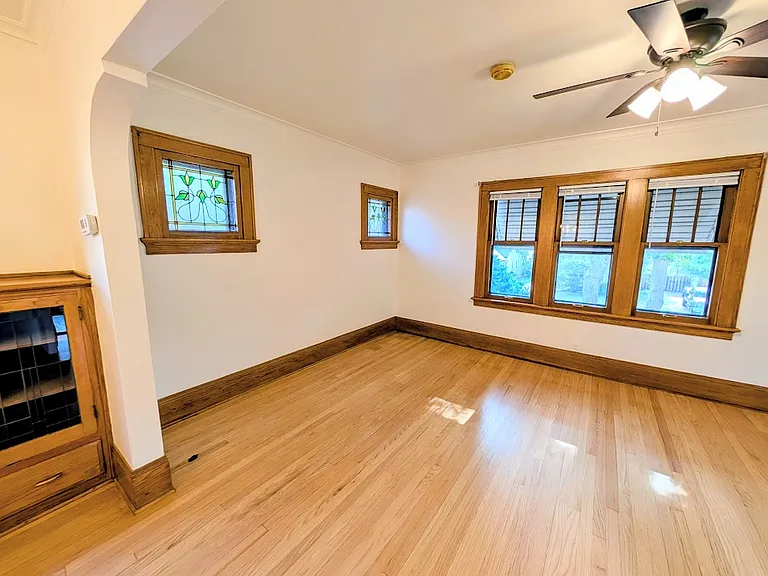 [UPPER UNIT]: newly refinished hardwood floors living room