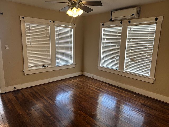 Bedroom - Has a closet and a mounted television.