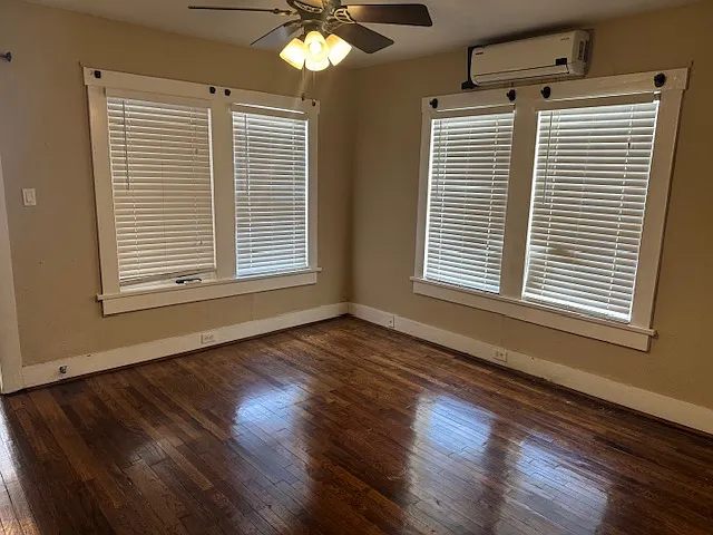 Bedroom - Has a closet and a mounted television.