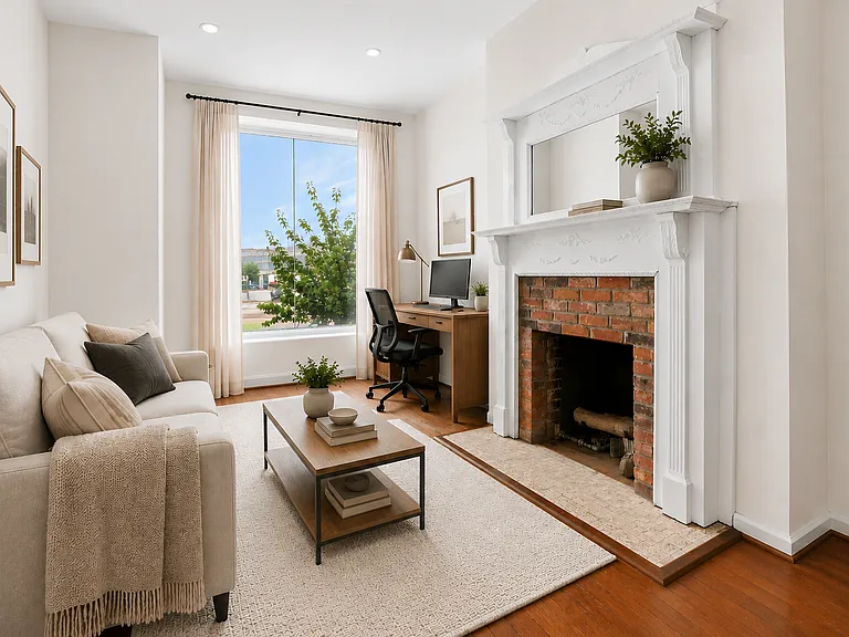 Front room staged as a living room/office