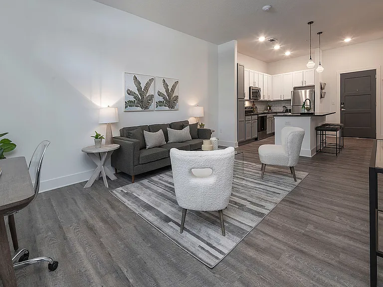 Explore the elegance of this open-concept living room, perfect for modern living.
