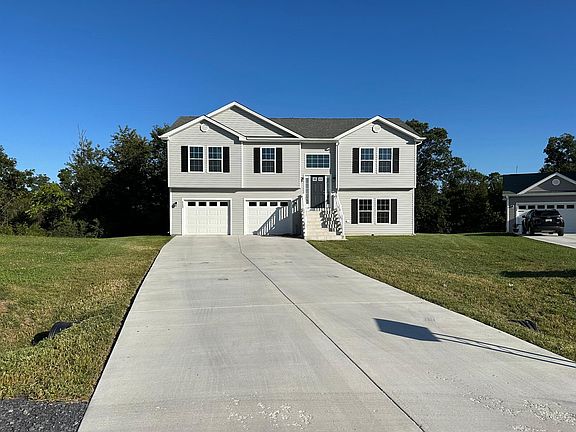 Front view with long drive-way