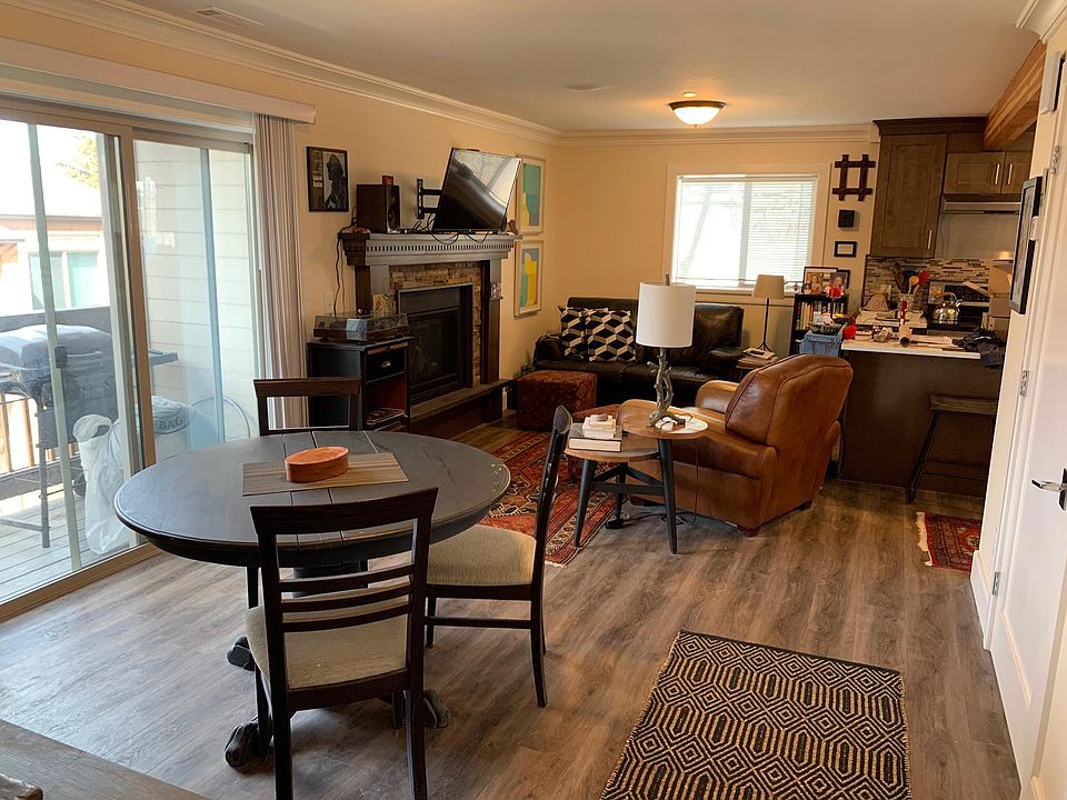 Open Living/Dining area with glass doors to balcony. (I will leave the grill.)