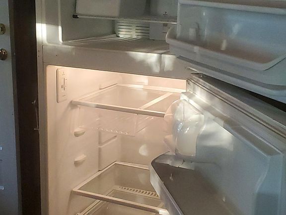 Kenmore Frost/Free Refrigerator and Ice Maker.