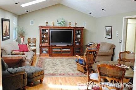 Living Room/Dining combination : Hardwood Floors with three skylights
