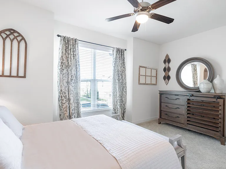 Experience tranquility in this beautifully designed bedroom, perfect for relaxation.