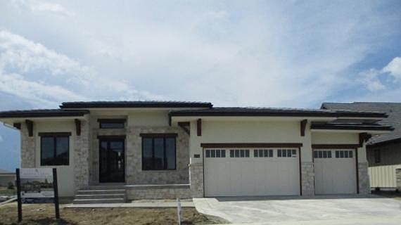 Luxury ranch home in TPC Heron Lakes Golf Course Community