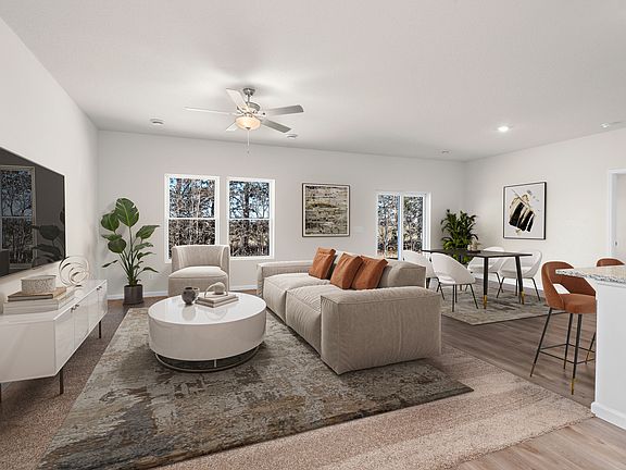 The family room is spacious and open to the dining area and kitchen.