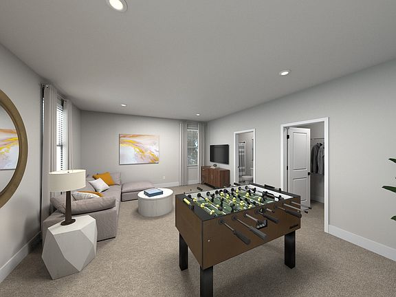 The upstairs bonus room gives the kids a place to hangout.