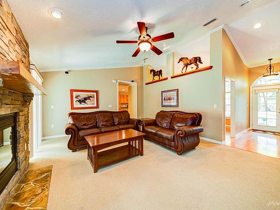 Decorative Stone Gas Fireplace with Plant Shelving