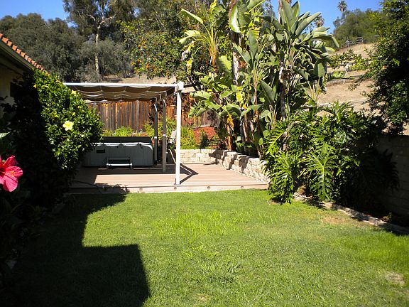 Back yard view from patio to deck