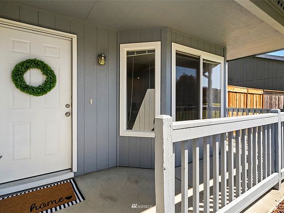Welcome home to this inviting covered porch. 