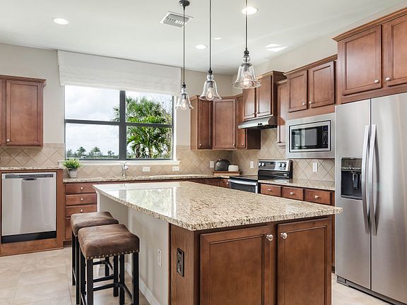 Model Representation Kitchen with center island and stainless steel appliances