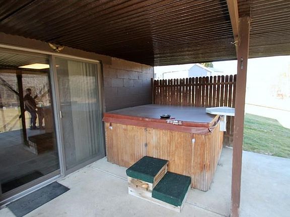 back patio with hot tub