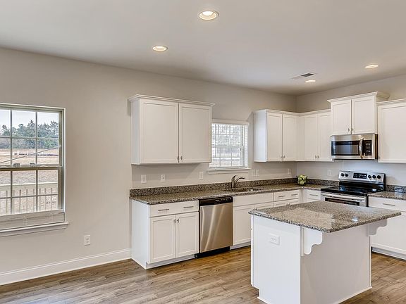 Light and bright kitchen with island.
