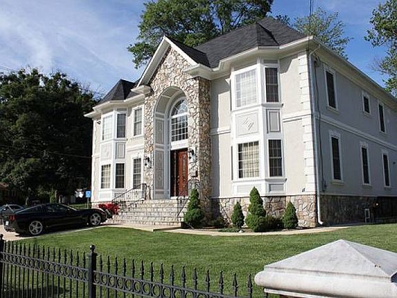 Wrought iron/stone fence