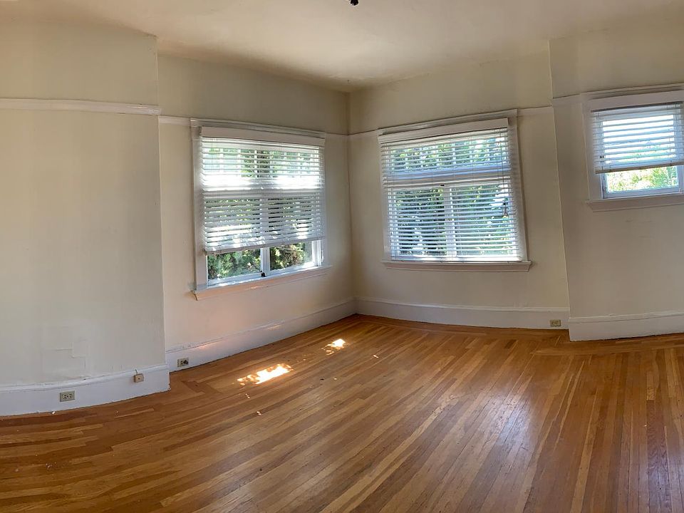 bedroom to the right of the living room