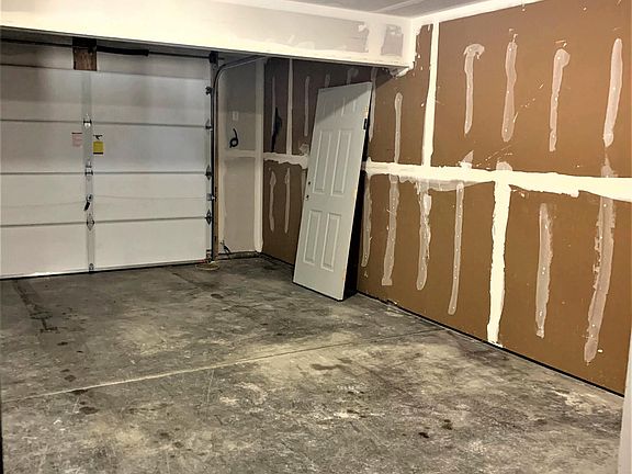 One car garage - room for a car and shelves