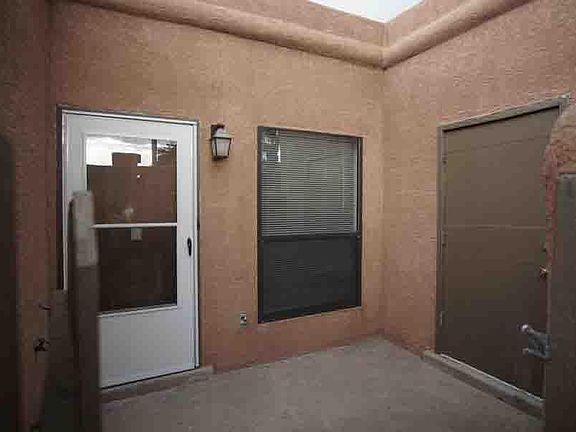 Enclosed patio with storage closet