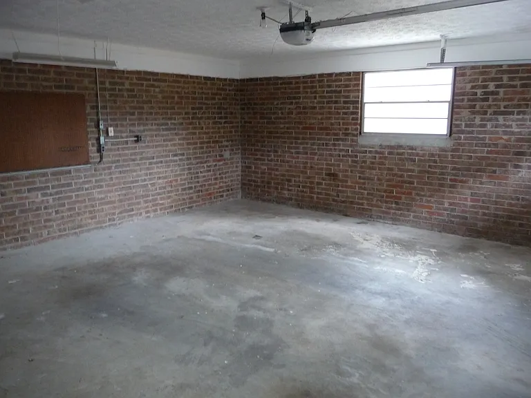 2 car garage. Also has door to sun room.