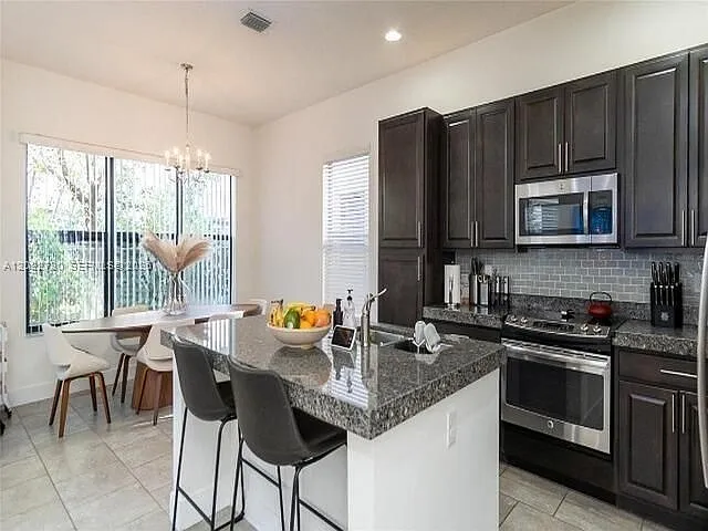9794 W 34th Ct — Photo 2