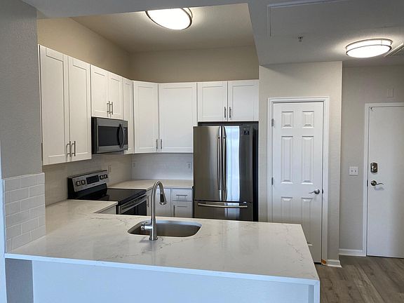 42 inch upper cabinets & stainless steel appliances.