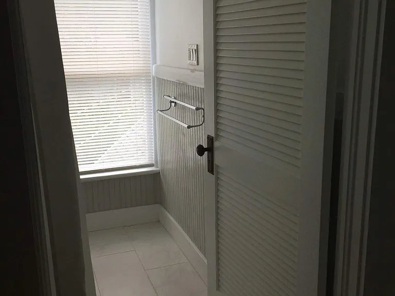 Looking into bathroom from bedroom