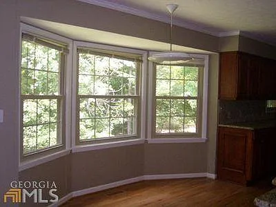 Family room windows looking towards backyard/lake