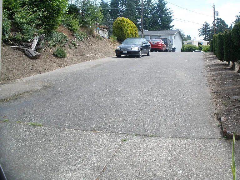 Long driveway can have several cars on one side.