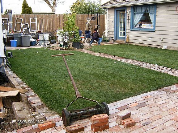 View of back yard and cottage.