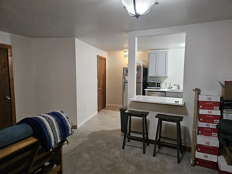 View of counter seating into kitchen area