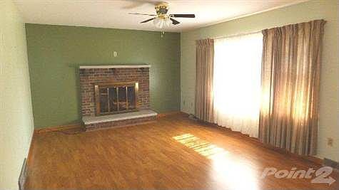 Living room. Large picture window lets in lots of light.