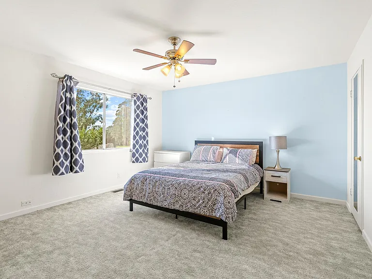 Upstairs bedroom 1 with big screen TV