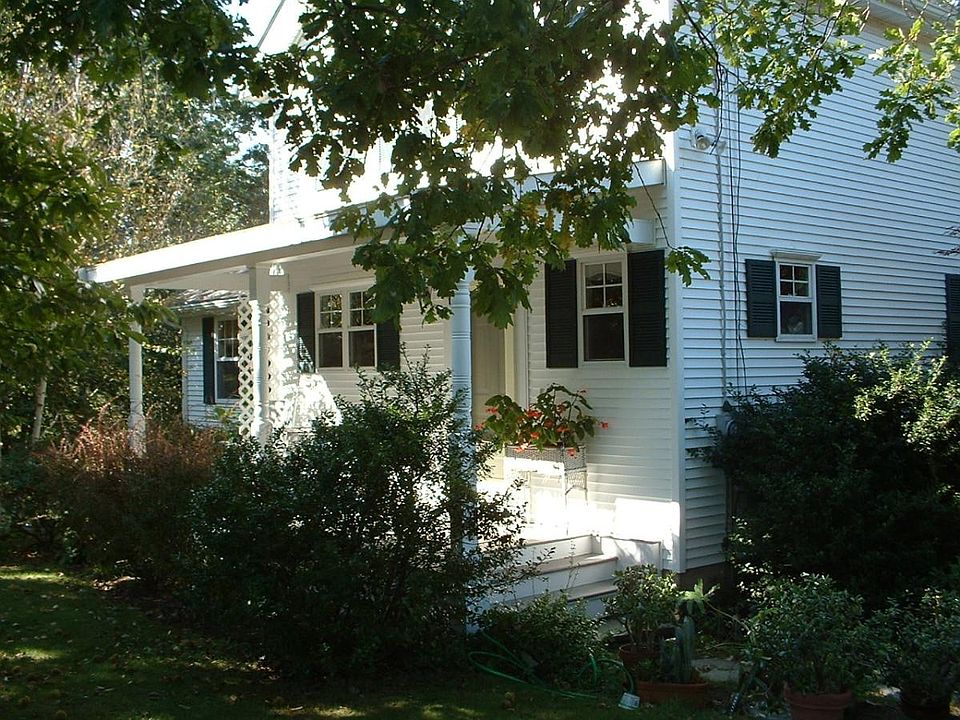 Front Entrance and covered porch facing East.