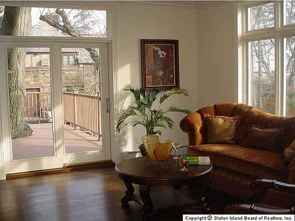 Family Room With Fireplace and Deck