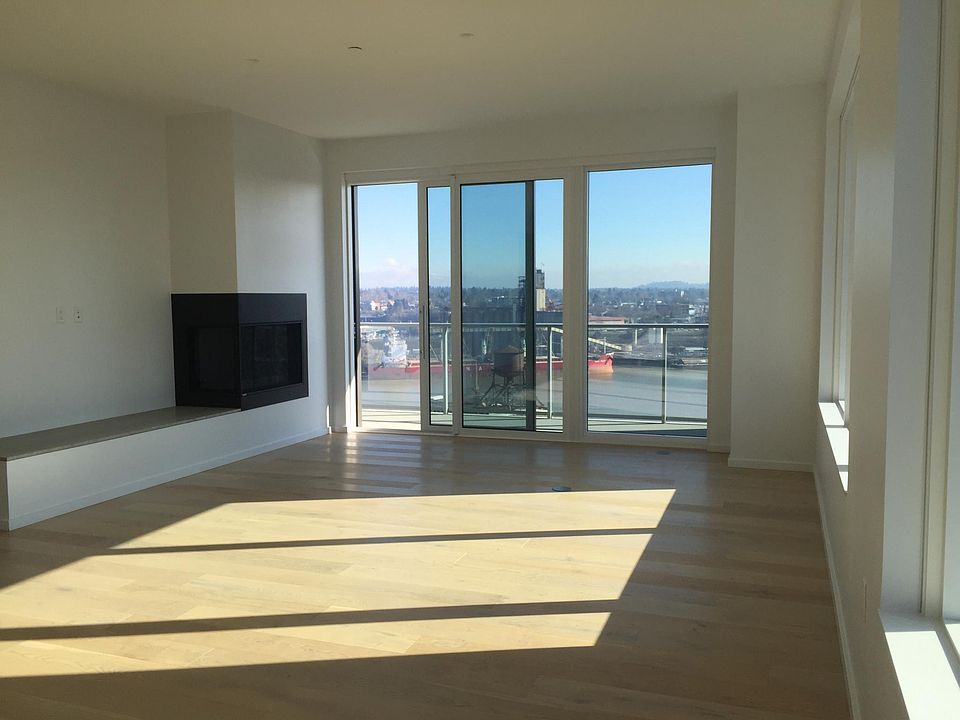 Main Living Area with access to 142SF balcony. Mt Hood and River Views.